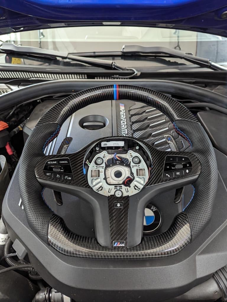 BMW G30 G32 G11 G14 STEERING WHEEL CARBON FIBER WITH PERFORATED LE bmw-g30-g32-g11-g14-steering-wheel-carbon-fiber-with-perforated-le