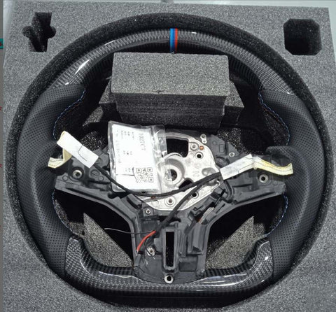 BMW G30/ G32/ G11/ G14 STEERING WHEEL ,CARBON FIBER WITH PERFORATED LEATHER , HEATED.