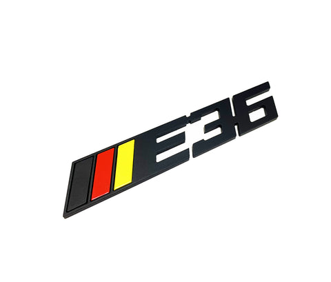 E36 METAL BADGE (BLACK) GERMAN COLORS